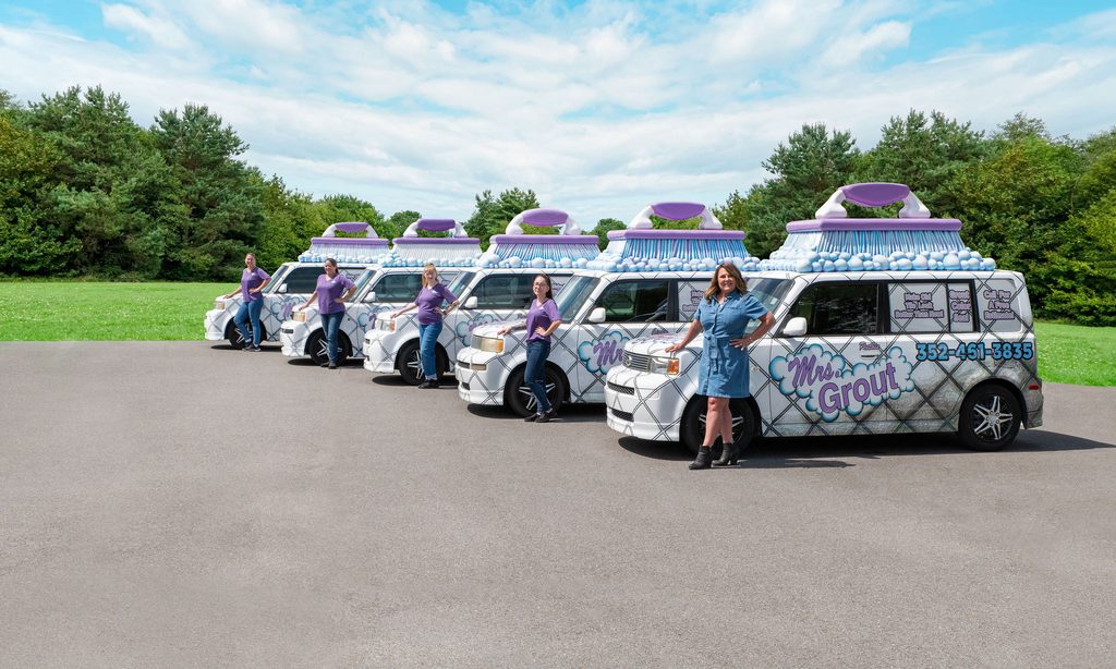 The Mrs. Grout team and fleet during a commercial photoshoot in Spring Hill, FL.